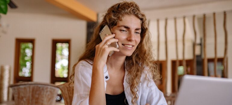 A woman talking on the phone.