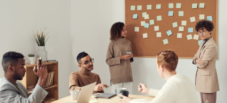 Group of people talking in office