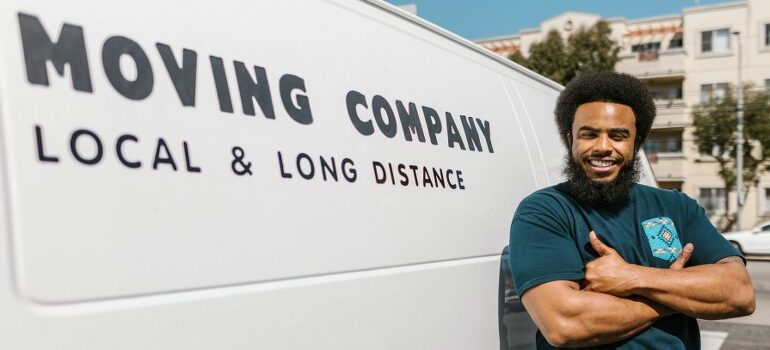 one of the commercial movers NYC in front of a van