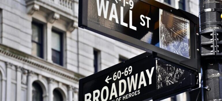 Broadway and Wall Street signs