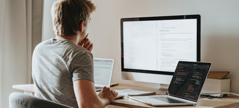 a person looking at the computer screen