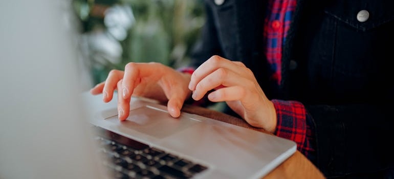 A person using a laptop.